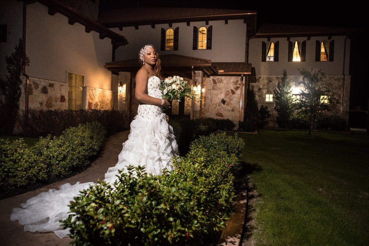 Bride outside the venue at night